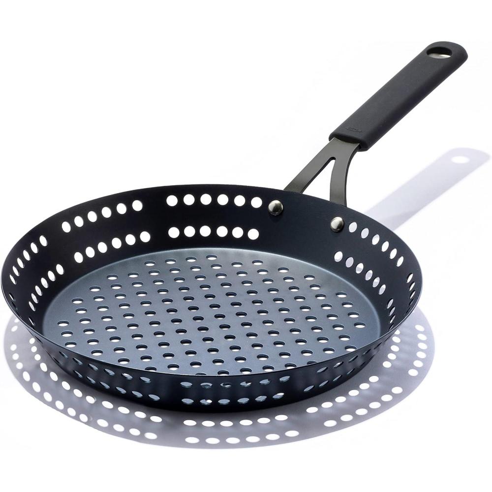 imageOXO Obsidian PreSeasoned Carbon Steel 12quot Frying Pan Skillet with Holes for Grilling with Removable Silicone Handle Holder Induction Oven Safe Black12 Outdoor Skillet